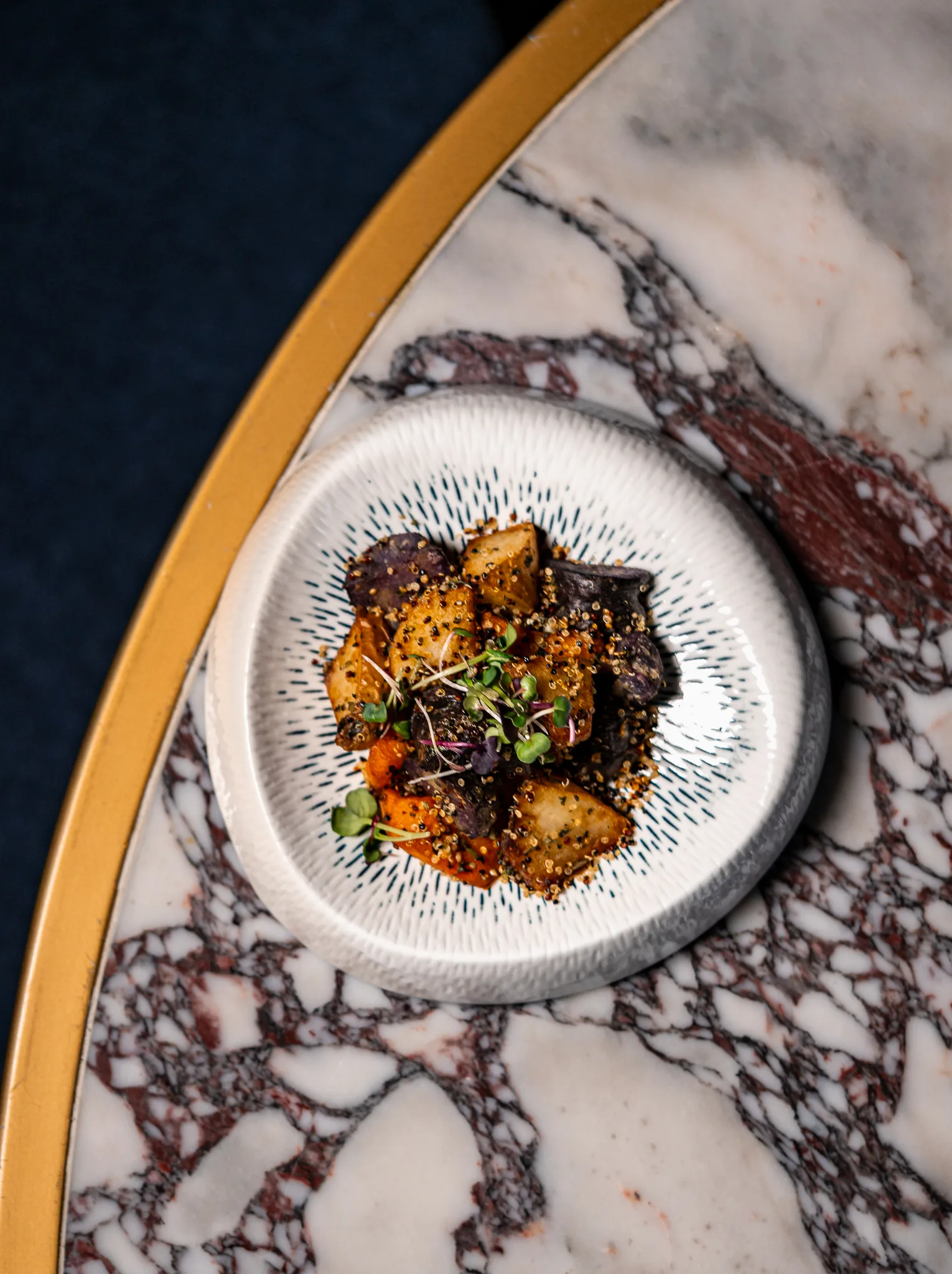 Andean Potato Mix - Roasted white, purple and sweet potato with herbs, maldon salt, crispy quinoa and sakura mix.