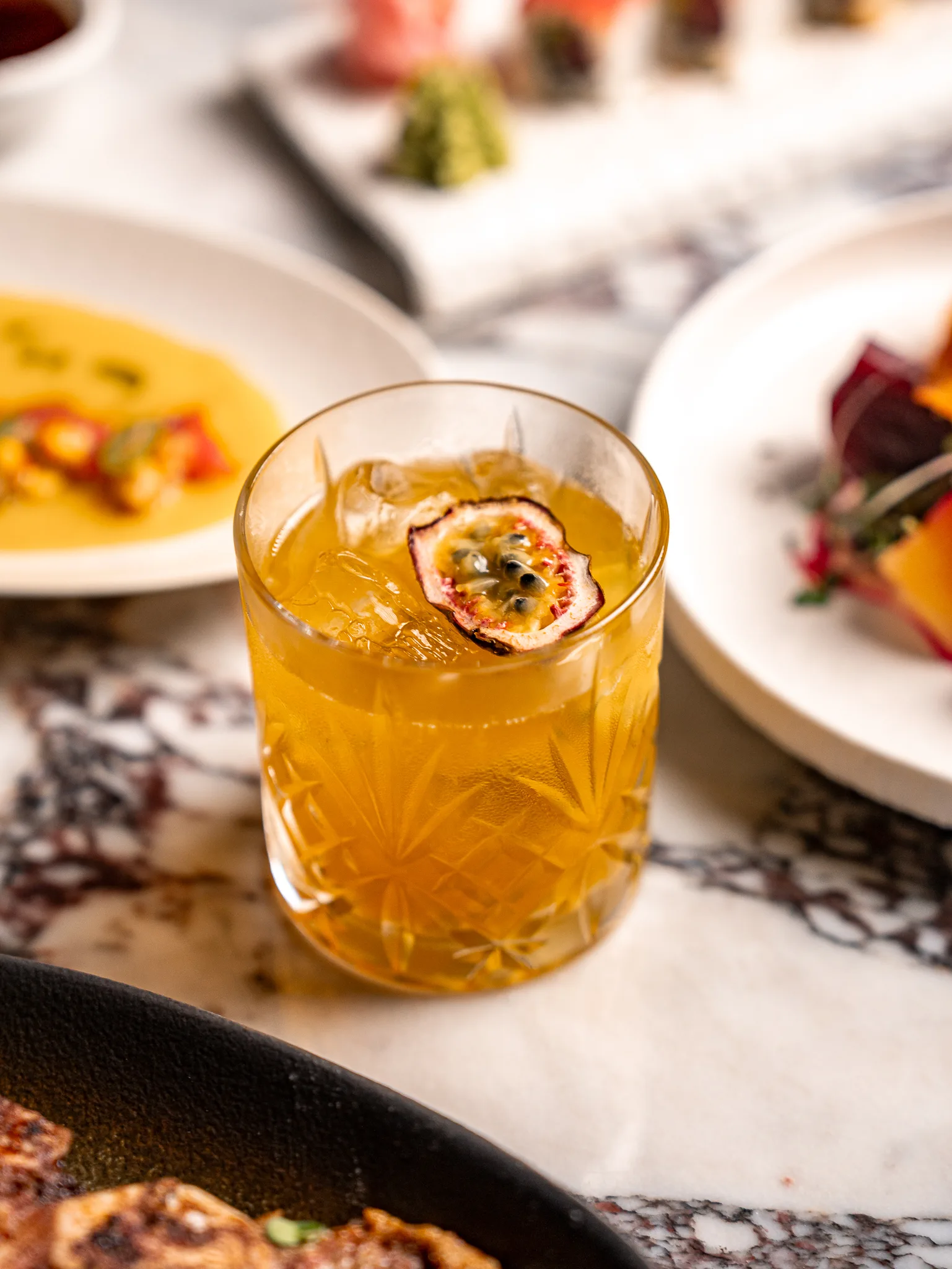 PassionFruit Caipiroska - A refreshing vodka-based cocktail blended with fresh passion fruit and zesty lime for tropical taste with a citrusy twist.