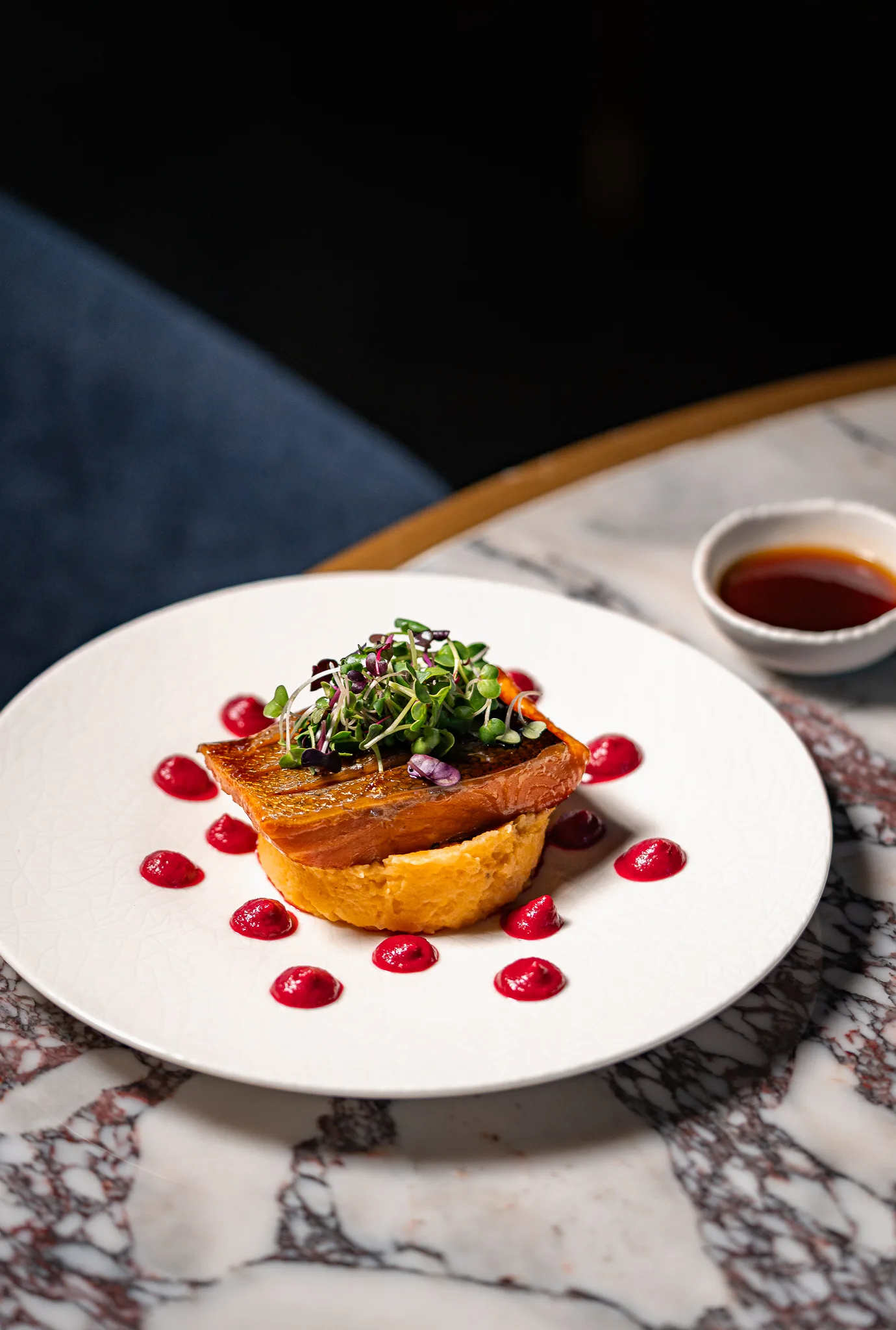 Salmon Teriyaki - Marinated salmon glazed with teriyaki, sweet mashed potato, beetroot emulsion and mint oil.